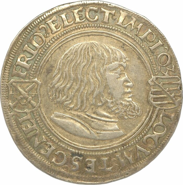 Eine Münze mit dem Abbild von Friedrich dem Weisen mit wallendem Haar